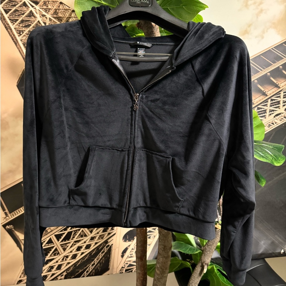 Black women’s velvet long sleeve sweater.